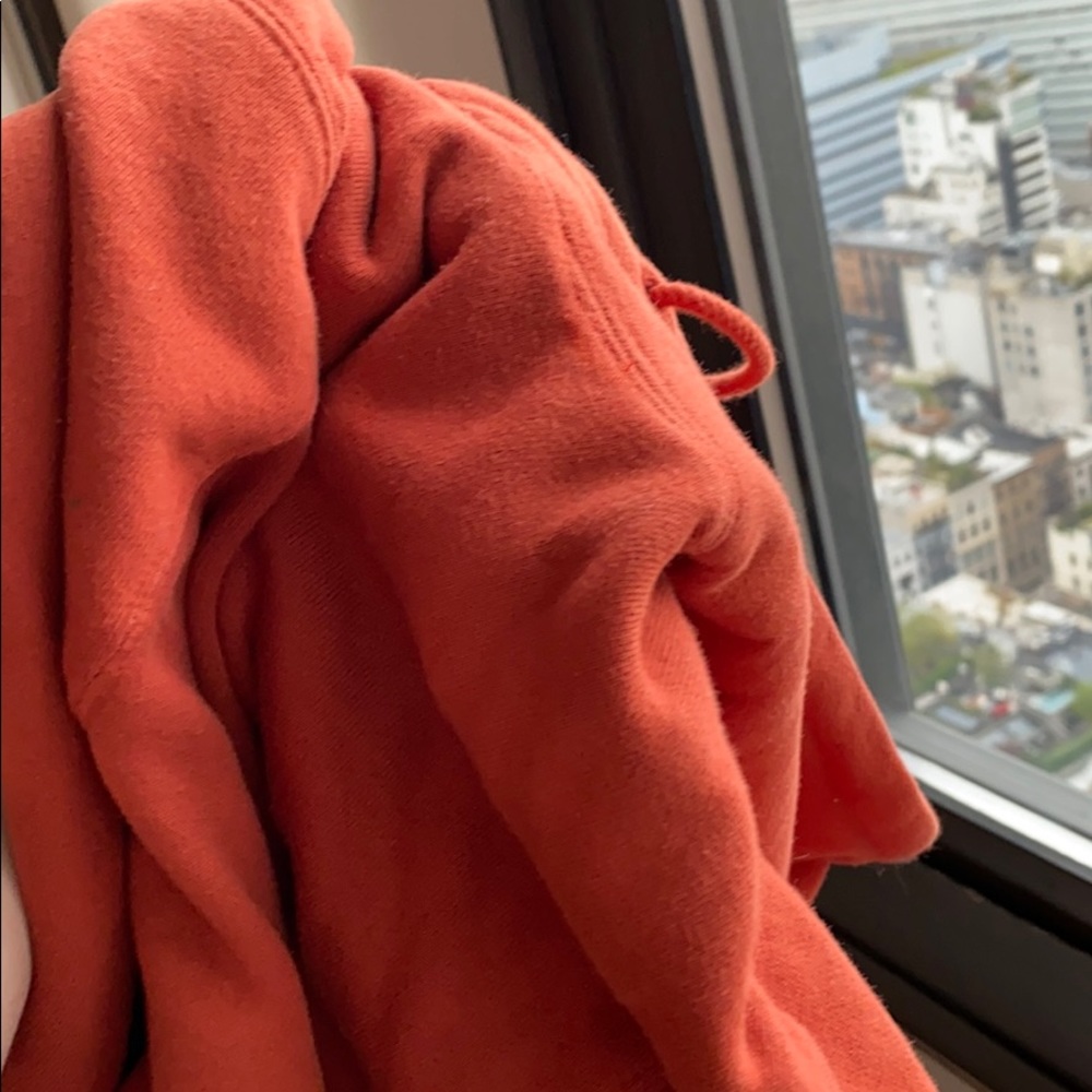 NWOT Brandy Melville orange pullover hoodie OS